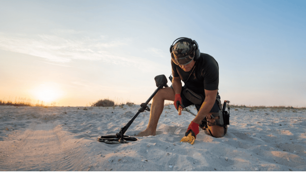 Metal detecting on the beach